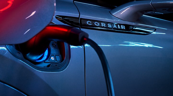 A charger plugged into the charging port of a 2024 Lincoln Corsair® Plug-in Hybrid model. | North Park Lincoln in San Antonio TX
